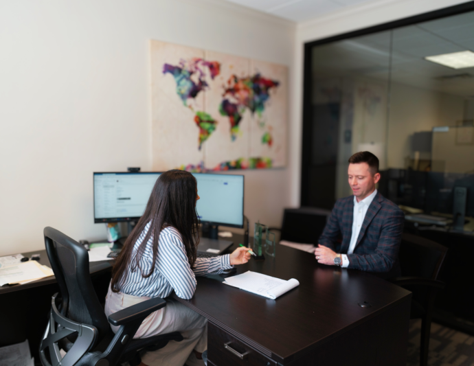 Travis and Courtney in the office