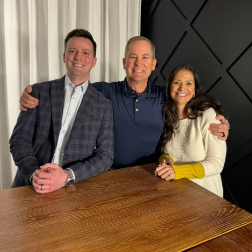 Courtney, Travis, and Ben smiling together